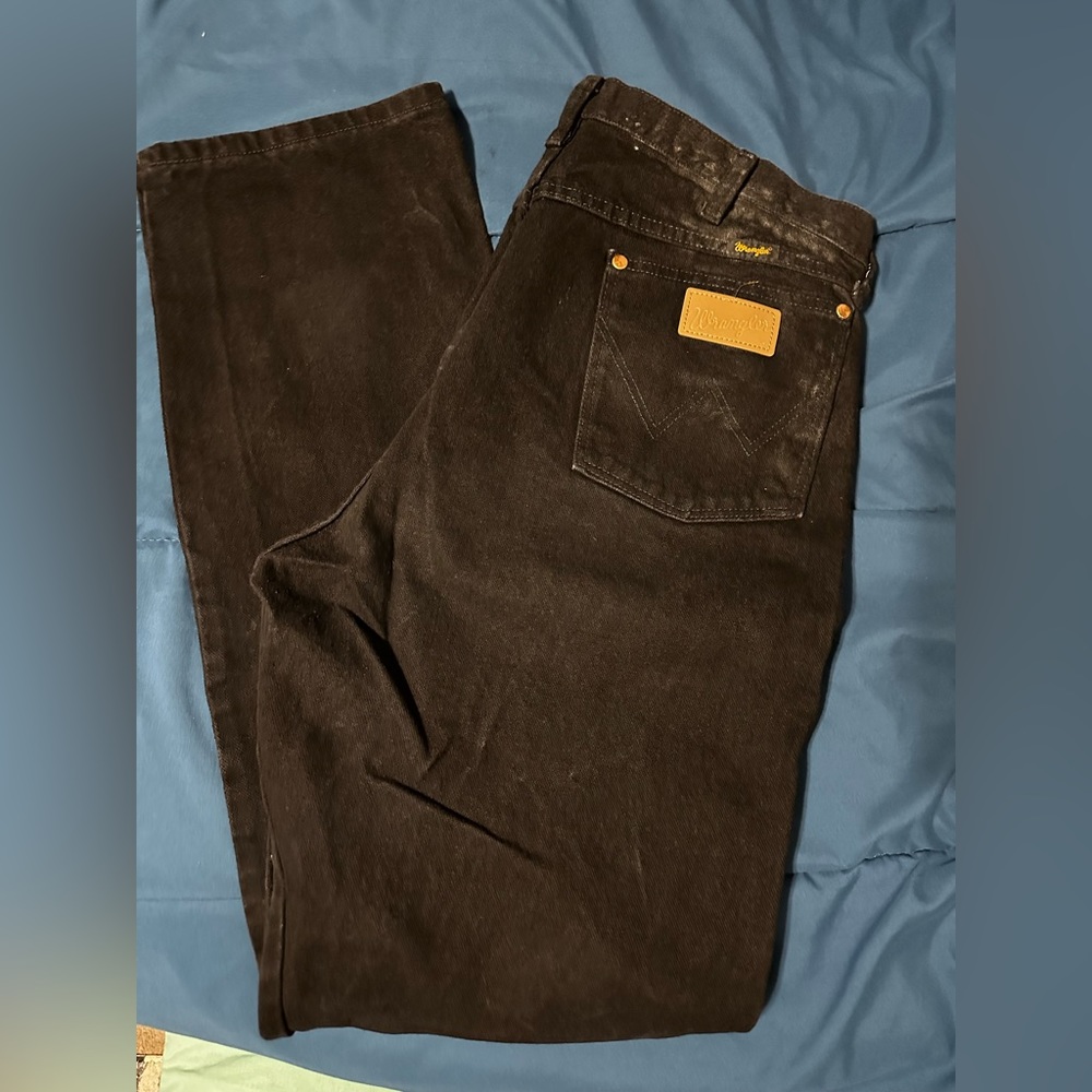 Black cowboy cut jeans
